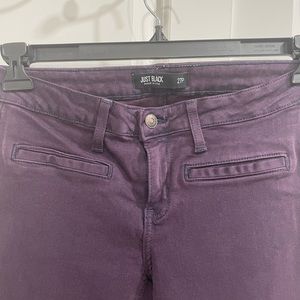 Dark purple low rise jeans.